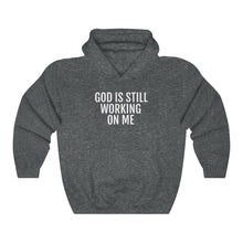 Load image into Gallery viewer, He's still Working - Unisex Heavy Blend™ Hooded Sweatshirt - Professional Hoodrat