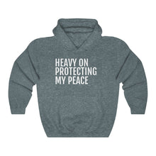 Load image into Gallery viewer, Heavy on Protecting My Peace - Unisex Heavy Blend™ Hooded Sweatshirt - Professional Hoodrat