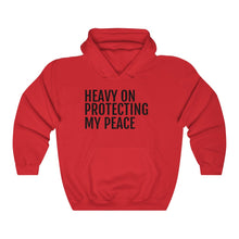 Load image into Gallery viewer, Heavy on Protecting My Peace - Unisex Heavy Blend™ Hooded Sweatshirt - Professional Hoodrat