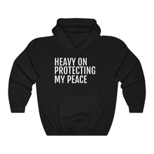 Load image into Gallery viewer, Heavy on Protecting My Peace - Unisex Heavy Blend™ Hooded Sweatshirt - Professional Hoodrat