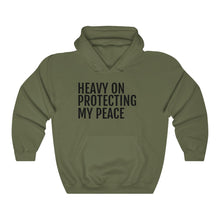 Load image into Gallery viewer, Heavy on Protecting My Peace - Unisex Heavy Blend™ Hooded Sweatshirt - Professional Hoodrat