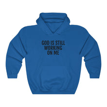 Load image into Gallery viewer, He's still Working - Unisex Heavy Blend™ Hooded Sweatshirt - Professional Hoodrat