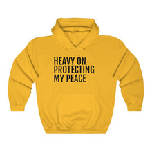 Load image into Gallery viewer, Heavy on Protecting My Peace - Unisex Heavy Blend™ Hooded Sweatshirt - Professional Hoodrat
