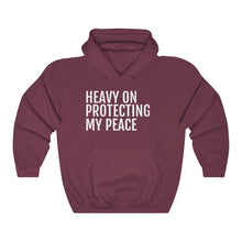 Load image into Gallery viewer, Heavy on Protecting My Peace - Unisex Heavy Blend™ Hooded Sweatshirt - Professional Hoodrat