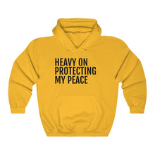 Load image into Gallery viewer, Heavy on Protecting My Peace - Unisex Heavy Blend™ Hooded Sweatshirt - Professional Hoodrat
